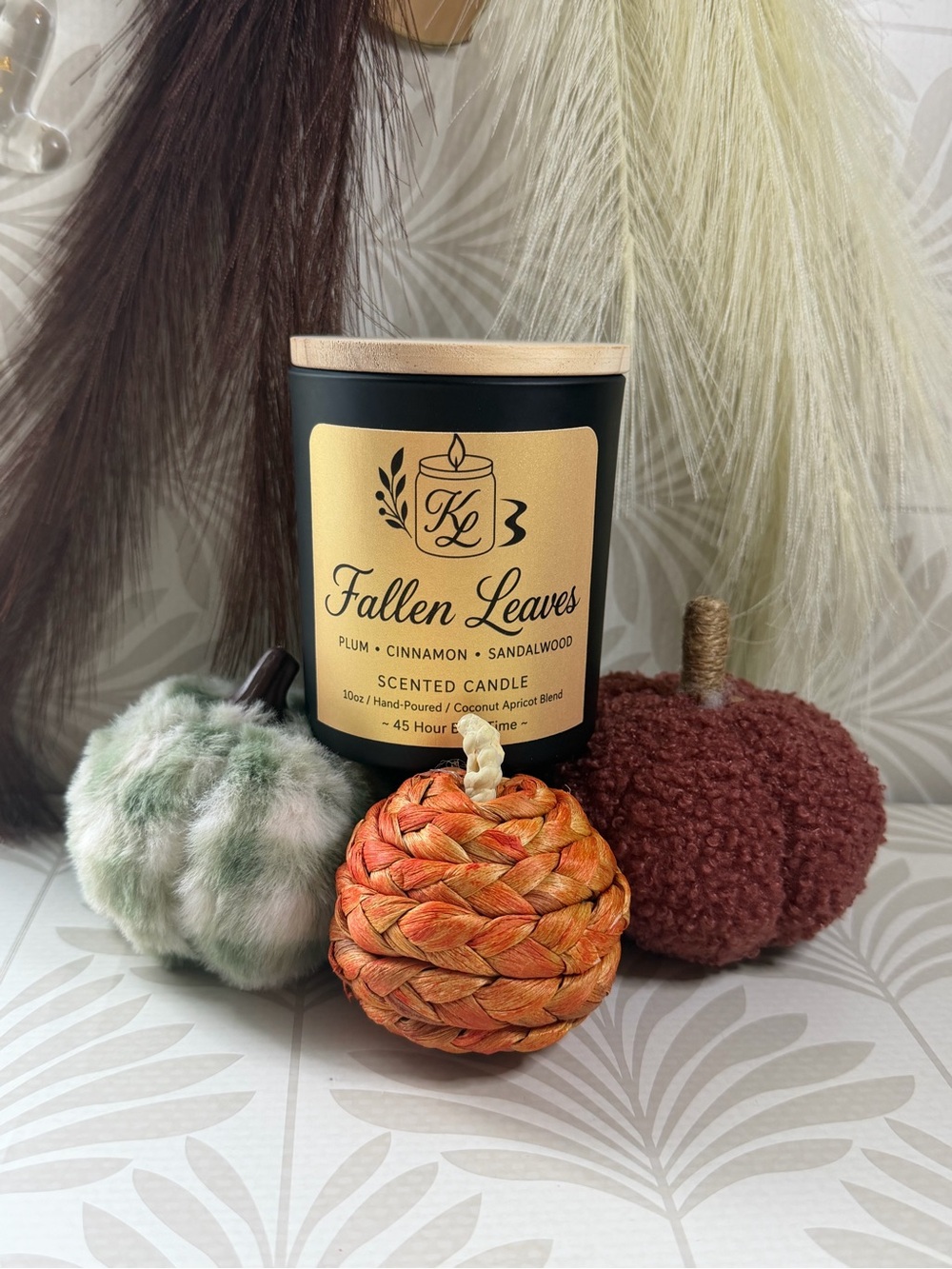 Fallen Leaves Scented Candle by — Black with Gold Label
